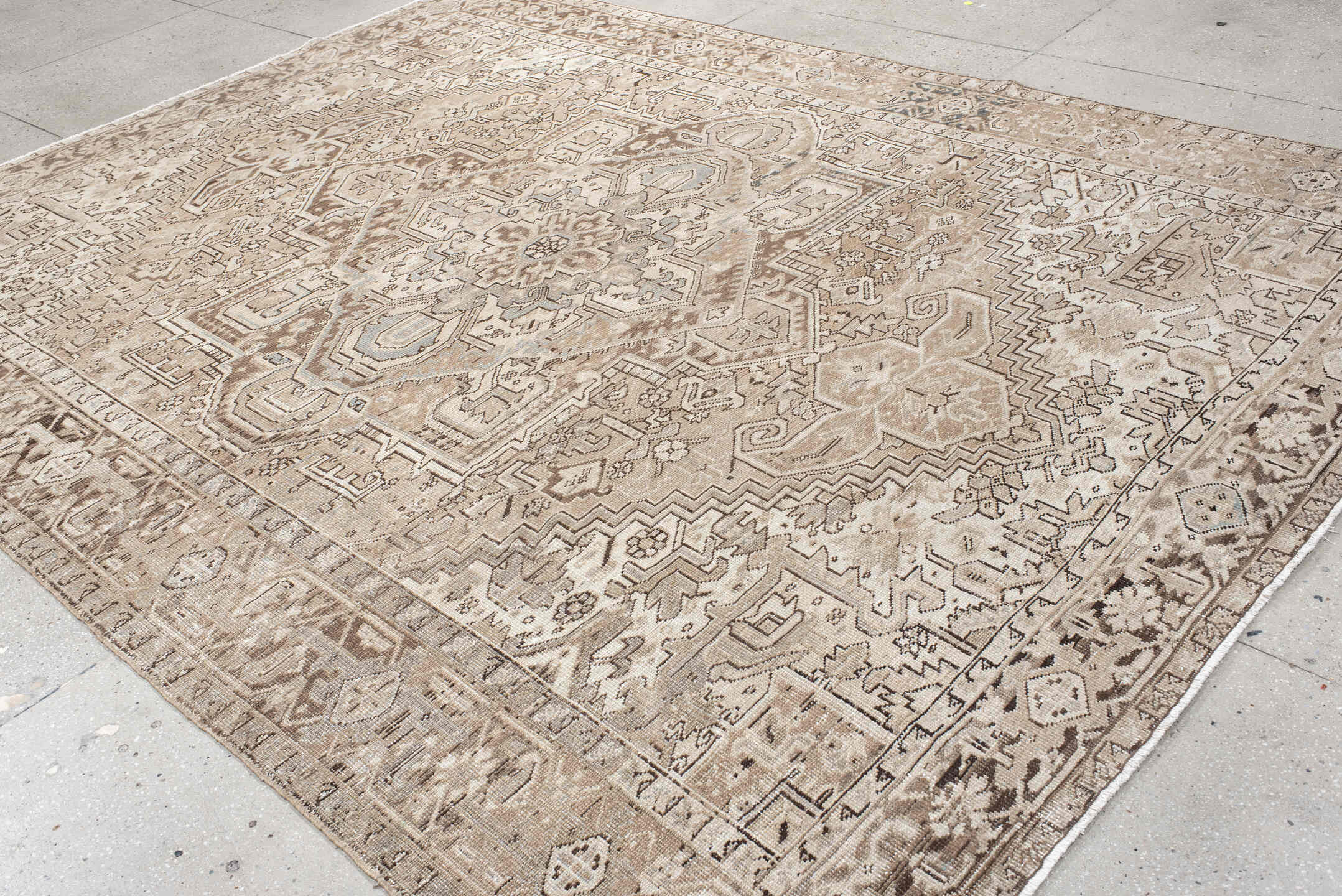 8' x 11' one-of-a-kind handmade antique Heriz large size rug. Color palette: ivory, taupe, beige, brown, camel, slate, gray