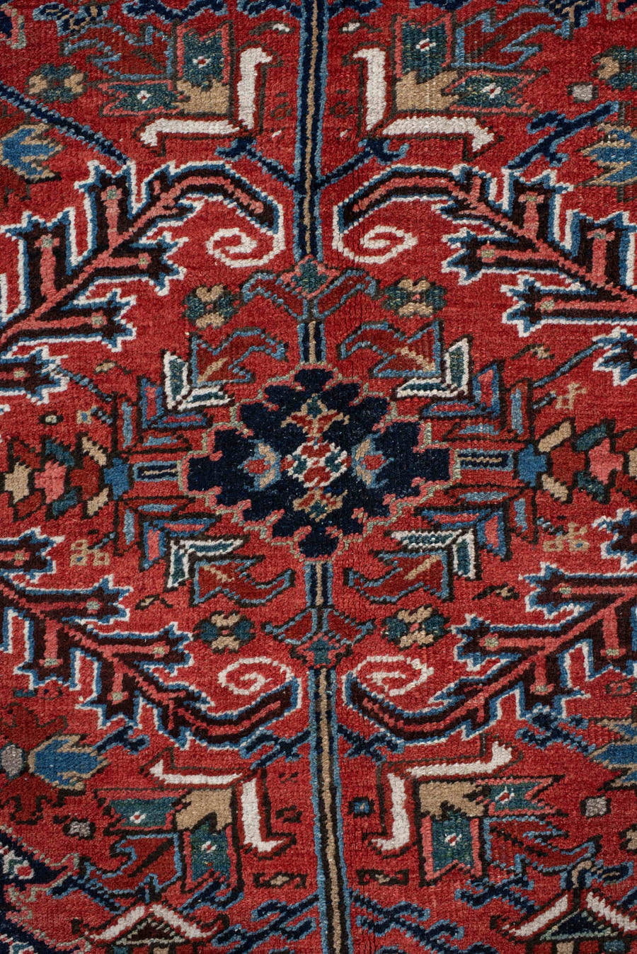 6' x 9' one-of-a-kind handmade antique Heriz medium size rug. Color palette: rust, navy, ivory, sky blue, coral, slate