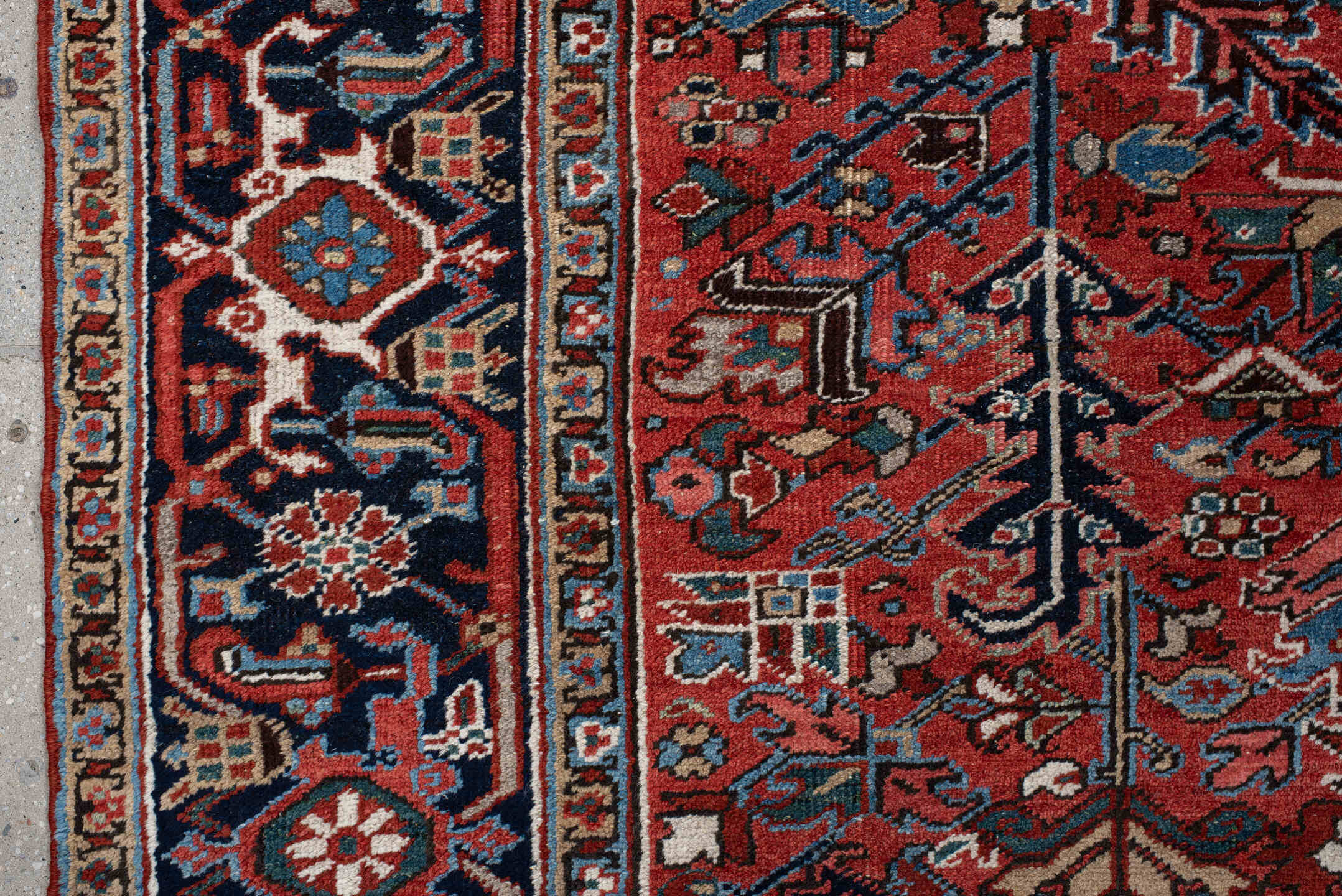 6' x 9' one-of-a-kind handmade antique Heriz medium size rug. Color palette: rust, navy, ivory, sky blue, coral, slate