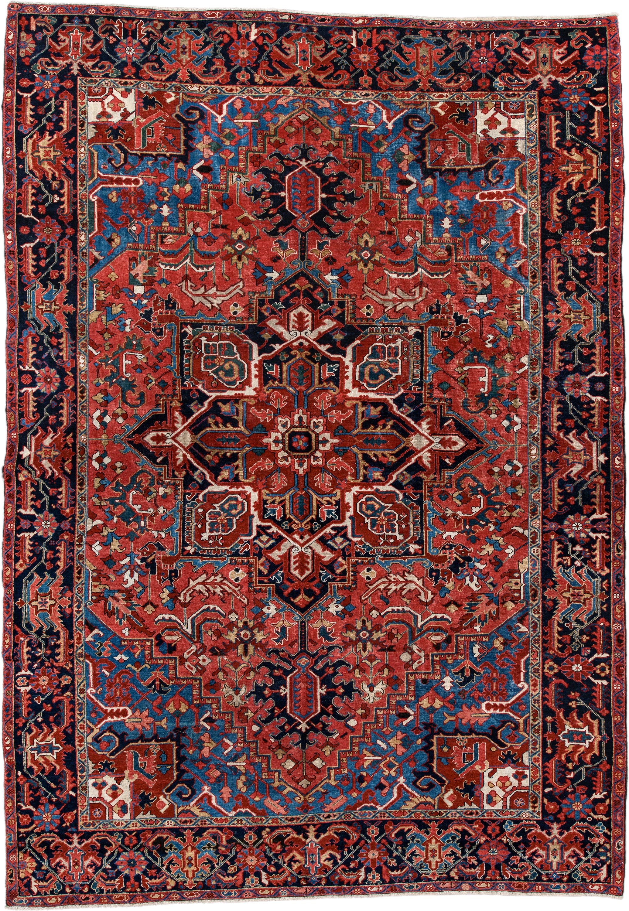 7' x 11' one-of-a-kind handmade antique Heriz large size rug. Color palette: rust, navy, sky_blue, ivory, brick, coral