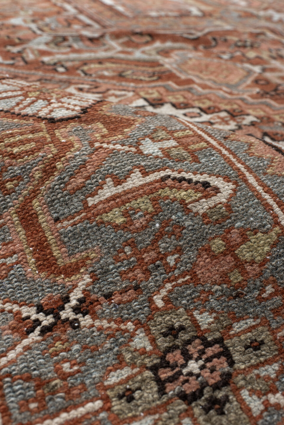 9' x 11' one-of-a-kind handmade vintage Heriz large size rug. Color palette: rust, blue-gray, ivory, coral, taupe, charcoal
