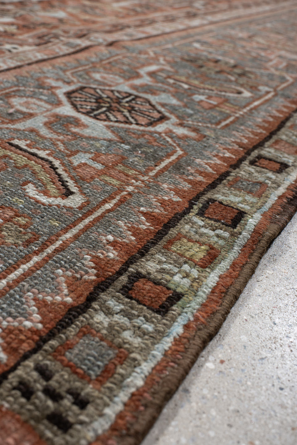 9' x 11' one-of-a-kind handmade vintage Heriz large size rug. Color palette: rust, blue-gray, ivory, coral, taupe, charcoal