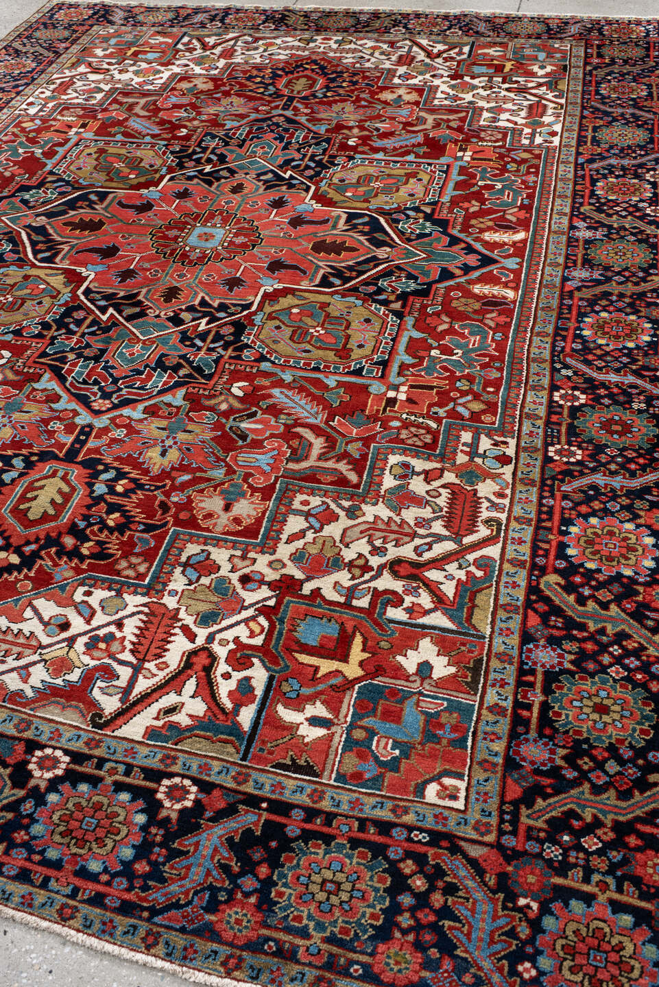 8' x 12' one-of-a-kind handmade vintage Heriz large size rug. Color palette: rust, ivory, navy, sky_blue, coral, sage, camel