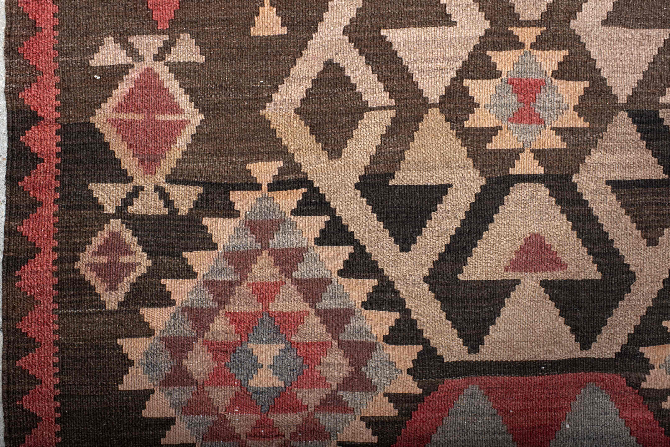 4' x 7' one-of-a-kind handmade antique Kilim rug. Color palette: brown, rust, ivory, slate, rose, charcoal, terracotta, gray