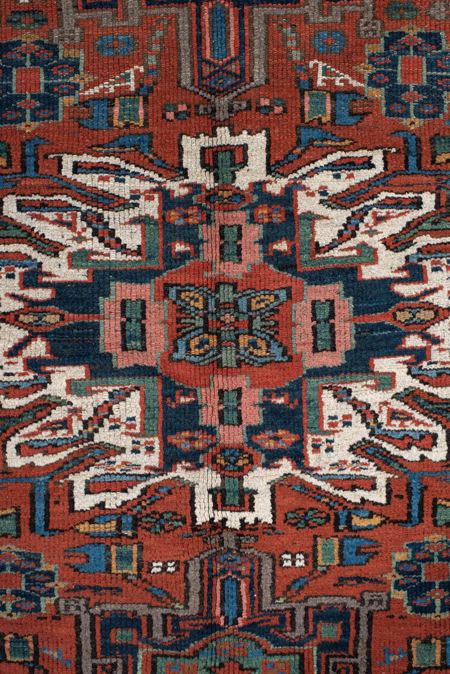 4' x 6' one-of-a-kind handmade vintage rug. Color palette: rust, teal, camel, navy, ivory, rose, brown, terracotta, beige