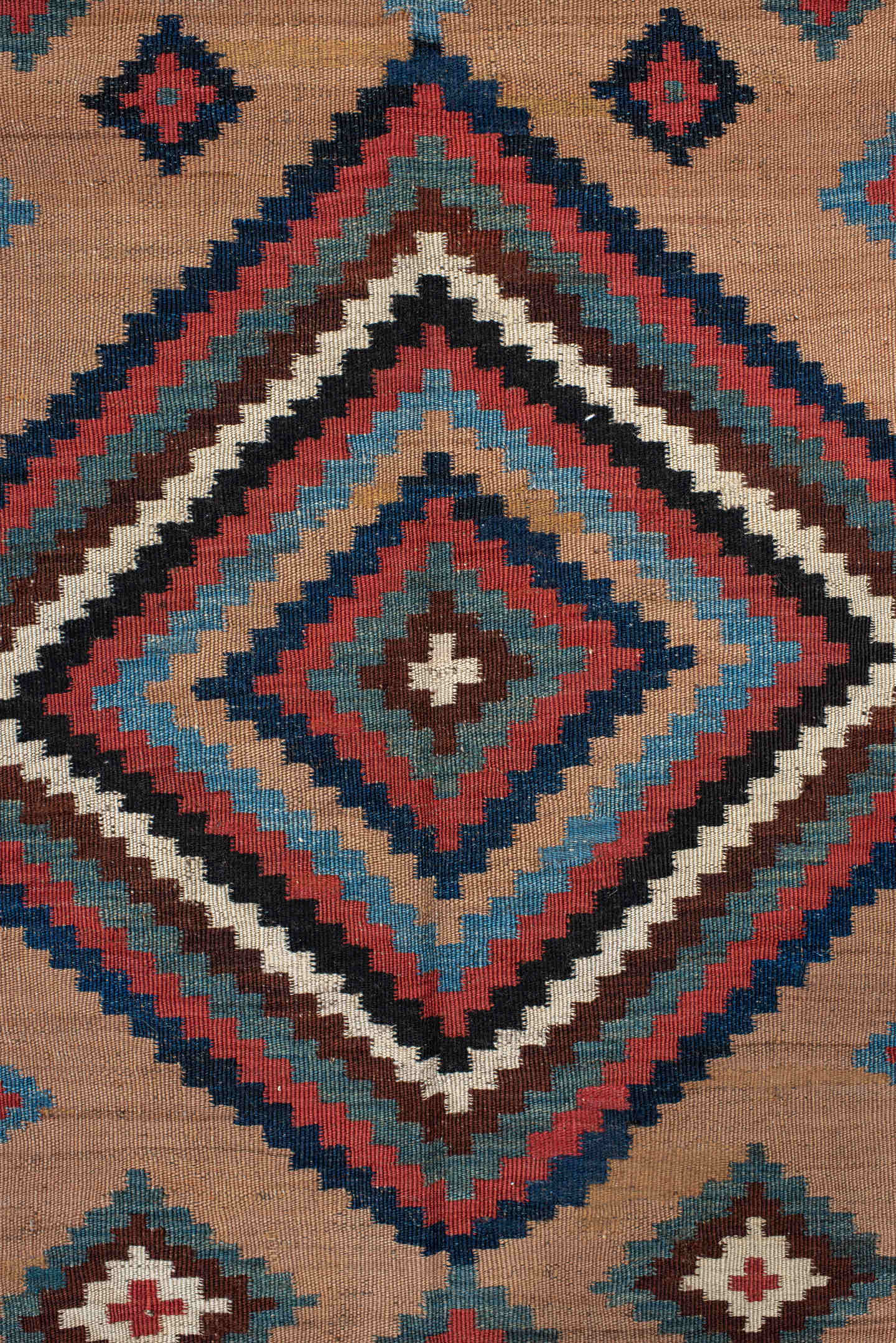 5' x 10' one-of-a-kind handmade antique Kilim runner rug. Color palette: camel, indigo, ivory, rust, turquoise, charcoal