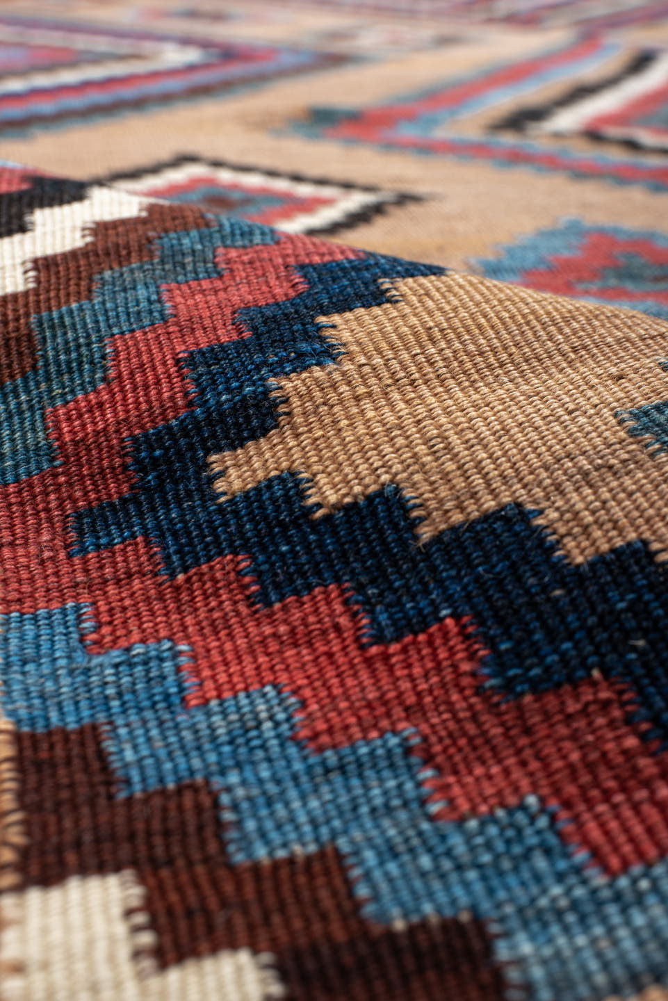 5' x 10' one-of-a-kind handmade antique Kilim runner rug. Color palette: camel, indigo, ivory, rust, turquoise, charcoal