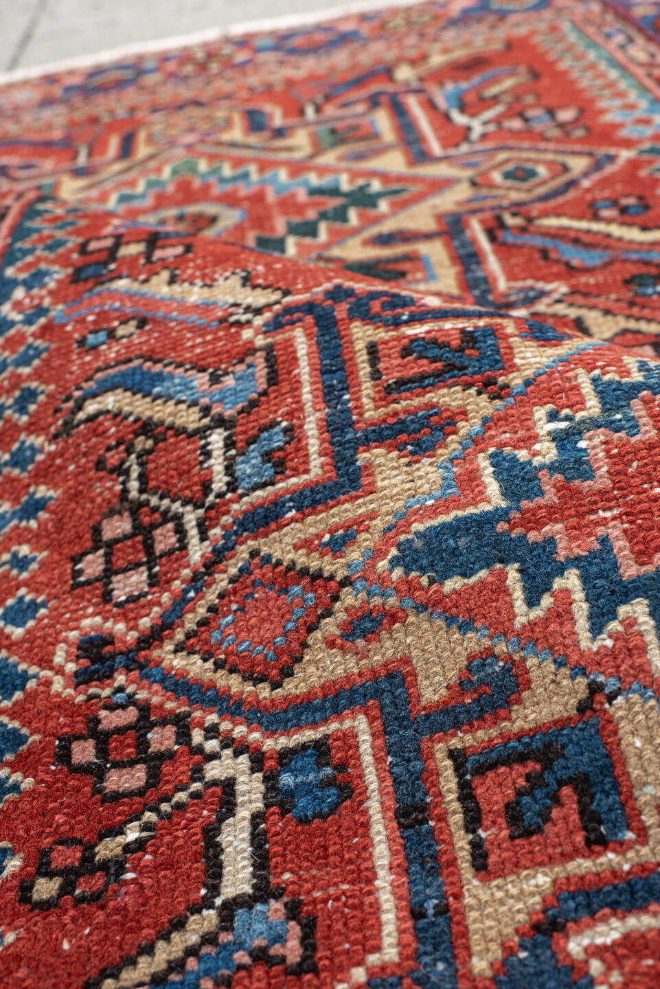 3' x 4' one-of-a-kind handmade antique Karaje small size rug. Color palette: rust, blue, ivory, navy, coral, teal, charcoal