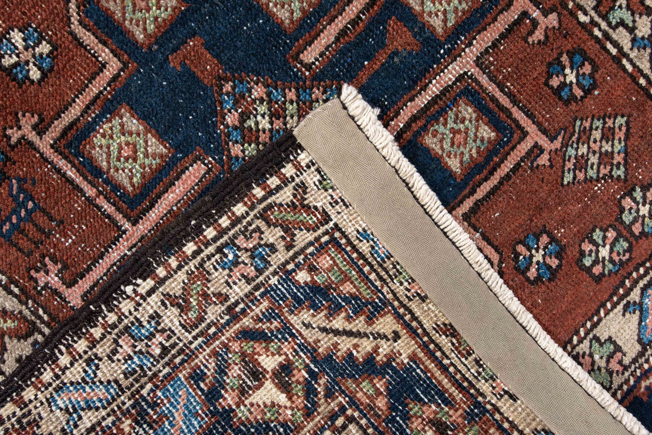 3' x 5' one-of-a-kind handmade antique Heriz small size rug. Color palette: rust, navy, ivory, sky_blue, brown, sage, camel