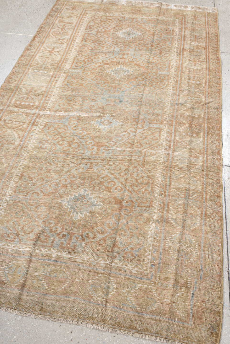 4' x 7' one-of-a-kind handmade vintage Belouch rug. Color palette: camel, taupe, ivory, pale aqua, blush, sand, light gray