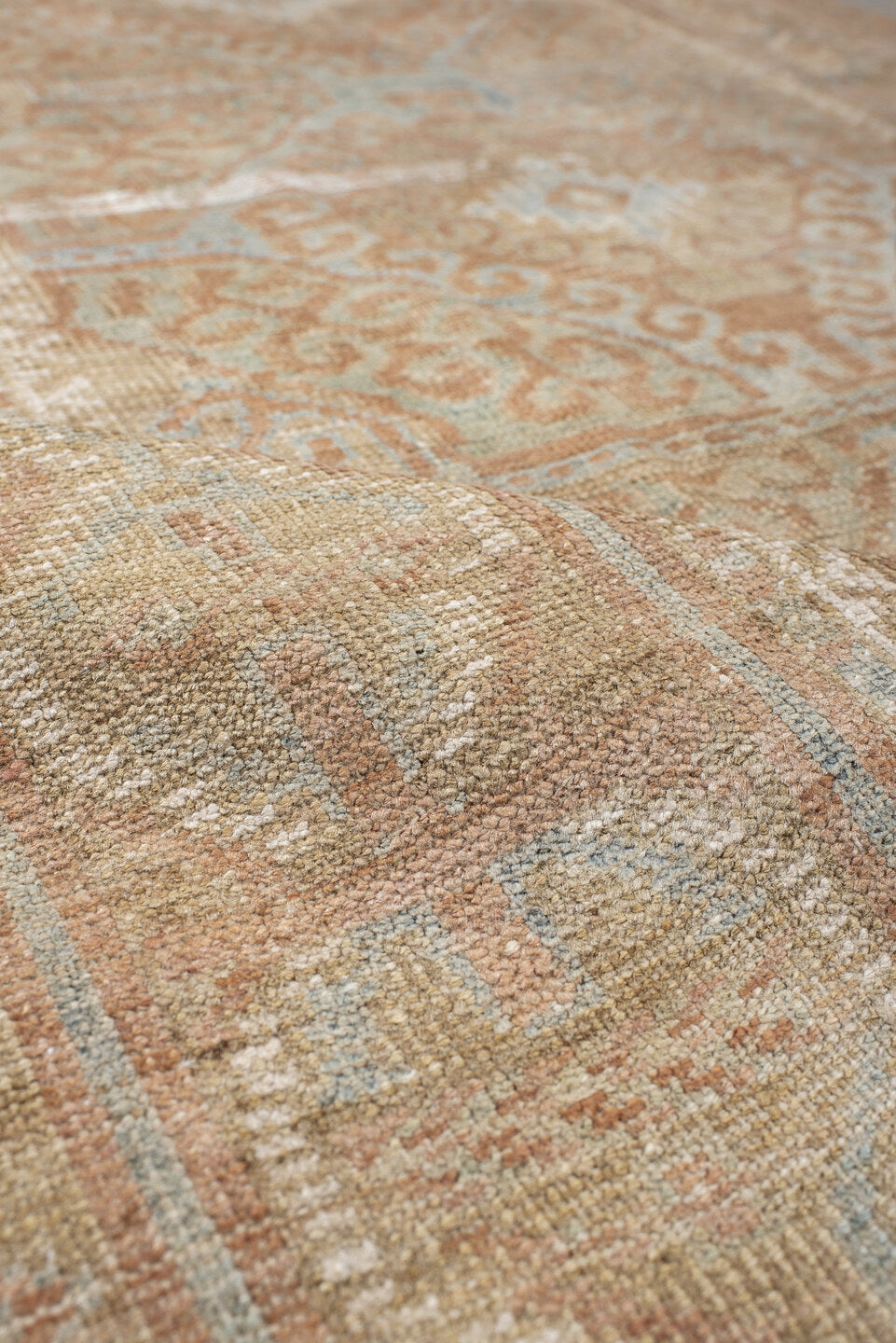 4' x 7' one-of-a-kind handmade vintage Belouch rug. Color palette: camel, taupe, ivory, pale aqua, blush, sand, light gray