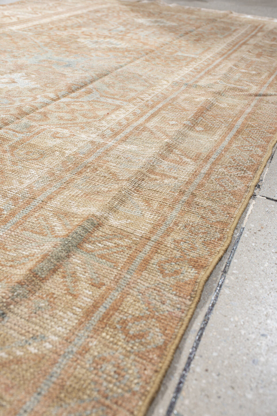 4' x 7' one-of-a-kind handmade vintage Belouch rug. Color palette: camel, taupe, ivory, pale aqua, blush, sand, light gray