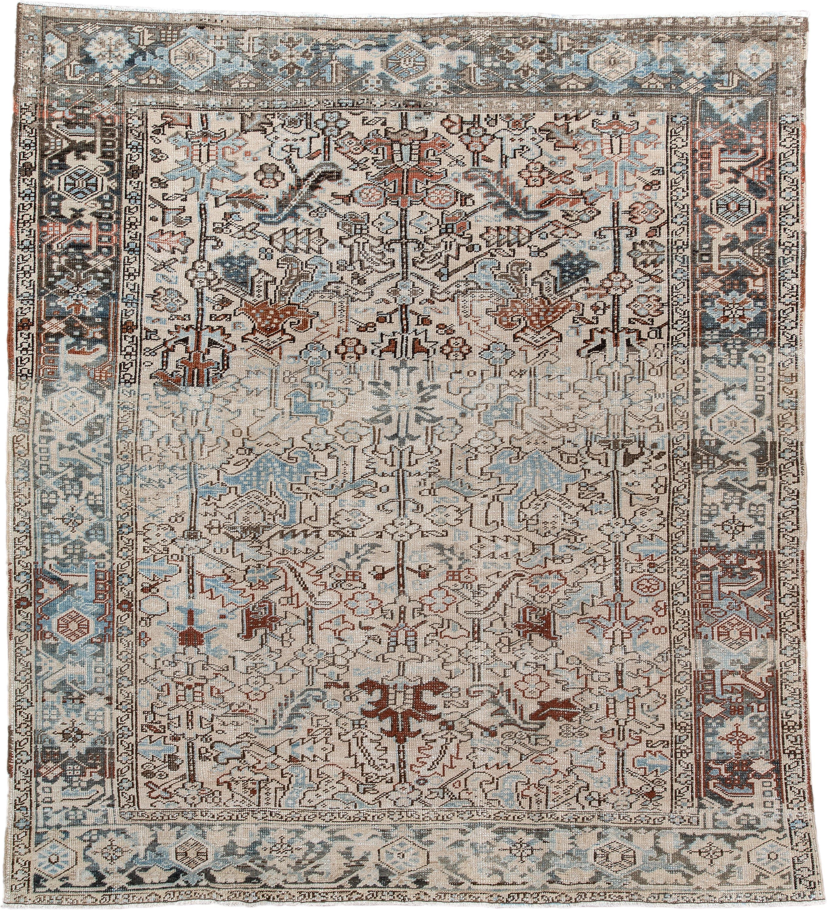 7' x 8' one-of-a-kind handmade antique Heriz rug. Color palette: ivory, sky blue, slate, taupe, rust, charcoal, camel