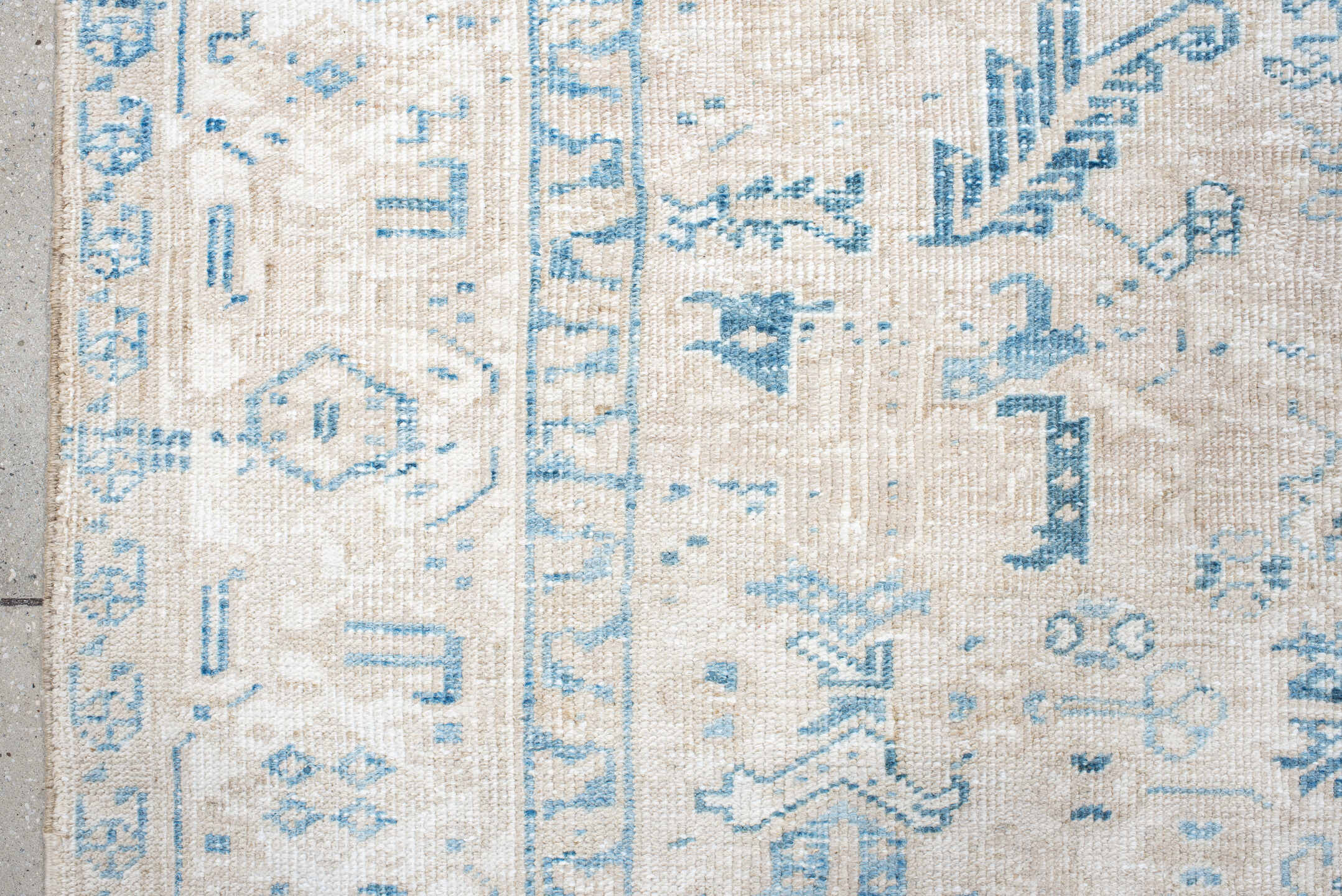 5' x 8' one-of-a-kind handmade antique Heriz medium size rug. Color palette: ivory, sky blue, ice blue, cream, beige