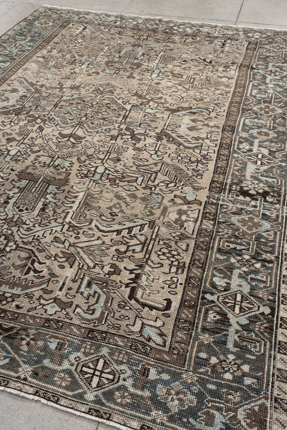 6' x 8' one-of-a-kind handmade antique medium size rug. Color palette: ivory, taupe, slate, charcoal, brown, sky blue