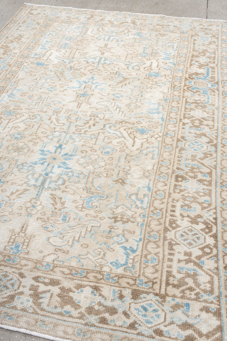 5' x 8' one-of-a-kind handmade vintage Heriz medium size rug. Color palette: ivory, taupe, sky blue, beige, gray, light blue