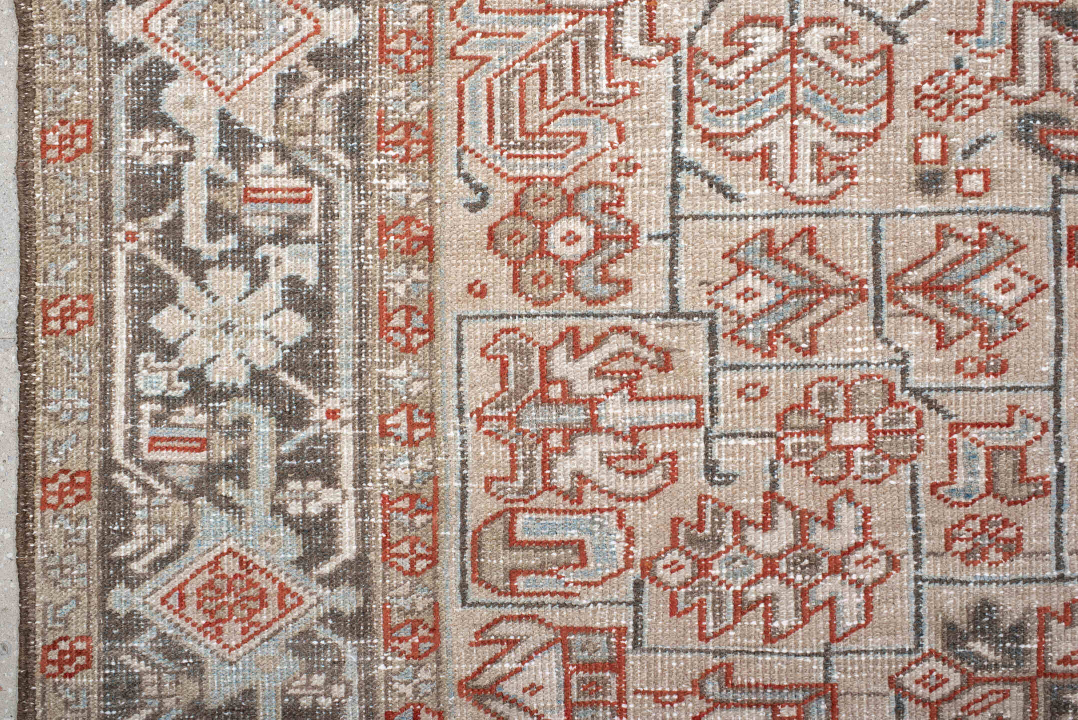 6' x 9' one-of-a-kind handmade antique Heriz medium size rug. Color palette: ivory, charcoal, rust, sky_blue, taupe, gray