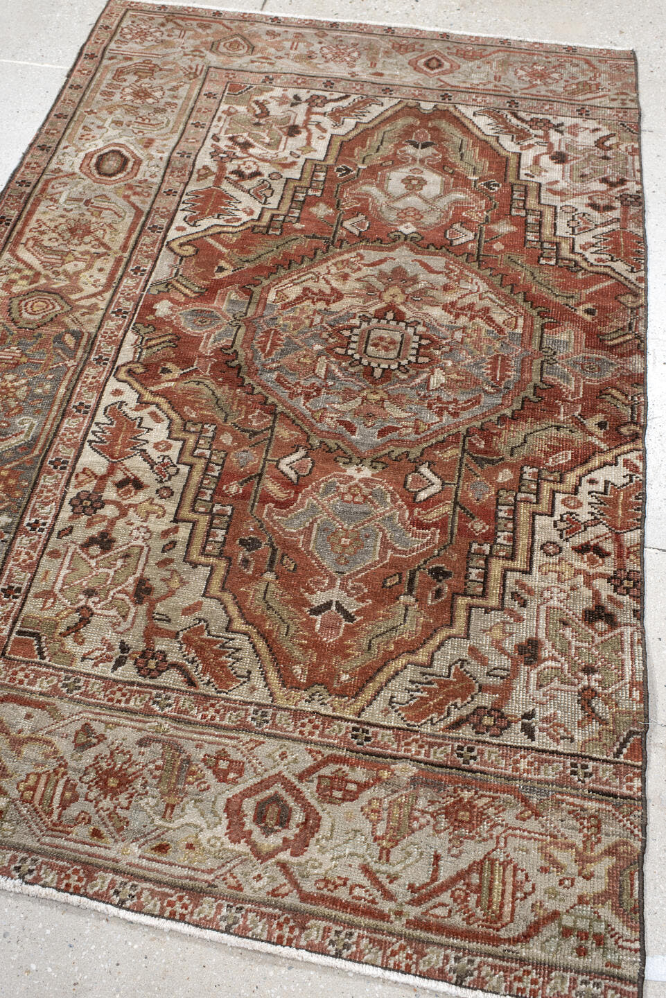 3' x 6' one-of-a-kind handmade vintage Heriz small size rug. Color palette: terra cotta, ivory, sage, taupe, charcoal, rust