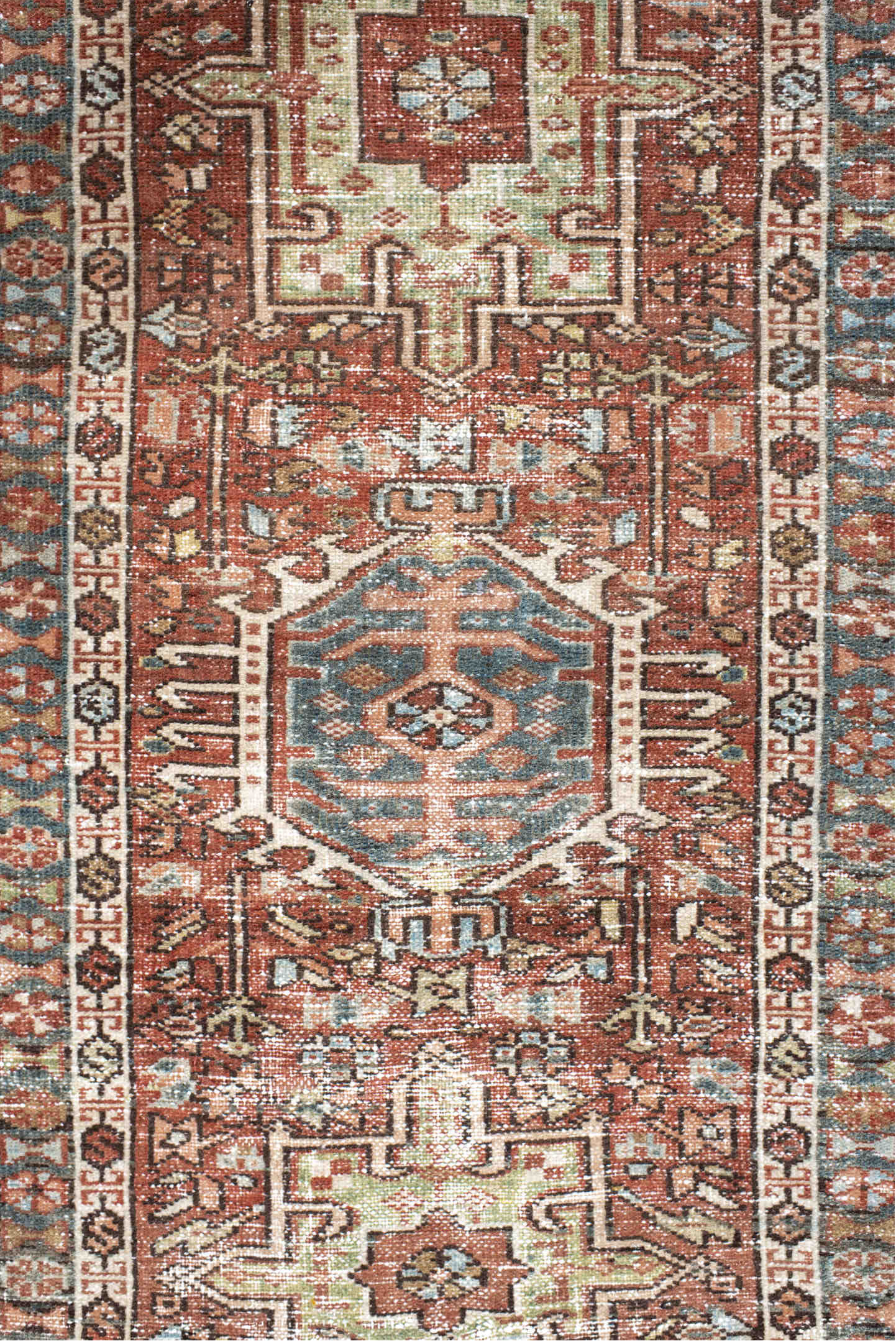 2' x 3' one-of-a-kind handmade vintage Karaje small size rug. Color palette: rust, ivory, blue, brown, sage, charcoal
