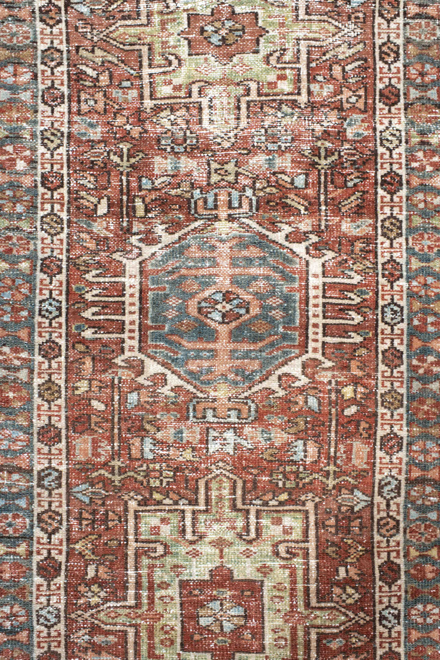 2' x 3' one-of-a-kind handmade vintage Karaje small size rug. Color palette: rust, ivory, blue, brown, sage, charcoal