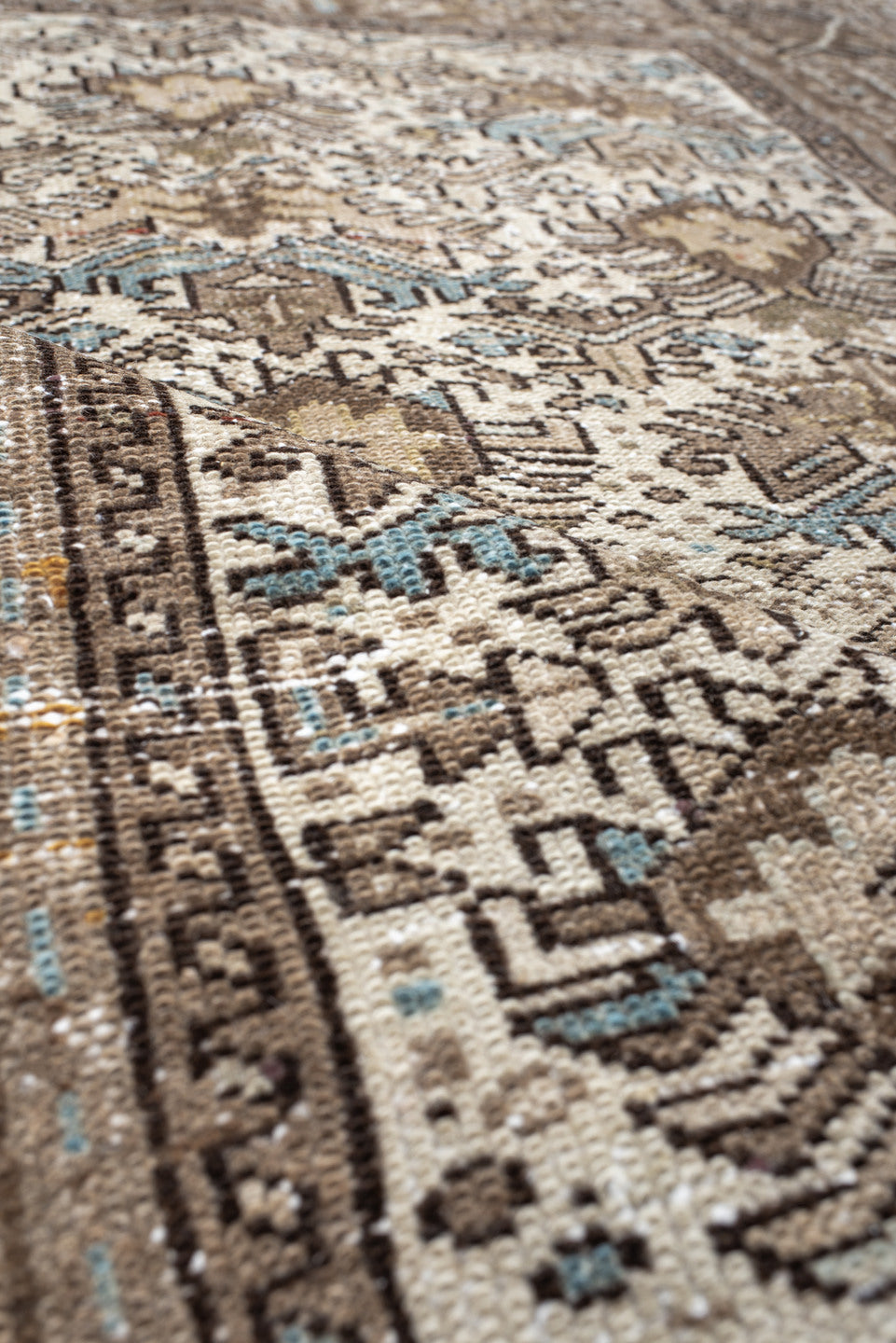 4' x 6' one-of-a-kind handmade antique Karaje small size rug. Color palette: ivory, taupe, brown, sky blue, charcoal, camel
