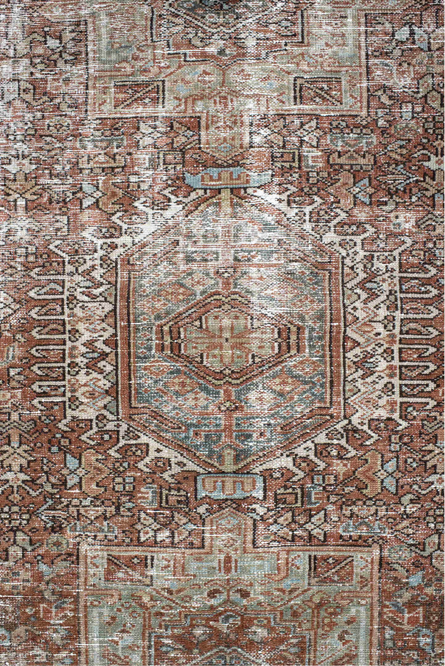4' x 5' one-of-a-kind handmade antique Karaje small size rug. Color palette: rust, ivory, sage, charcoal, terra cotta, taupe