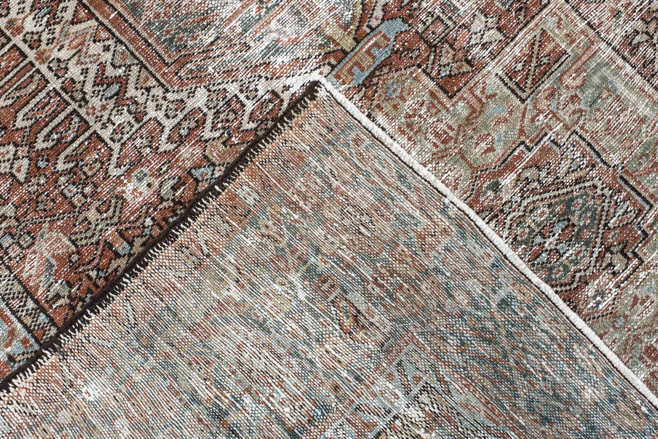 4' x 5' one-of-a-kind handmade antique Karaje small size rug. Color palette: rust, ivory, sage, charcoal, terra cotta, taupe