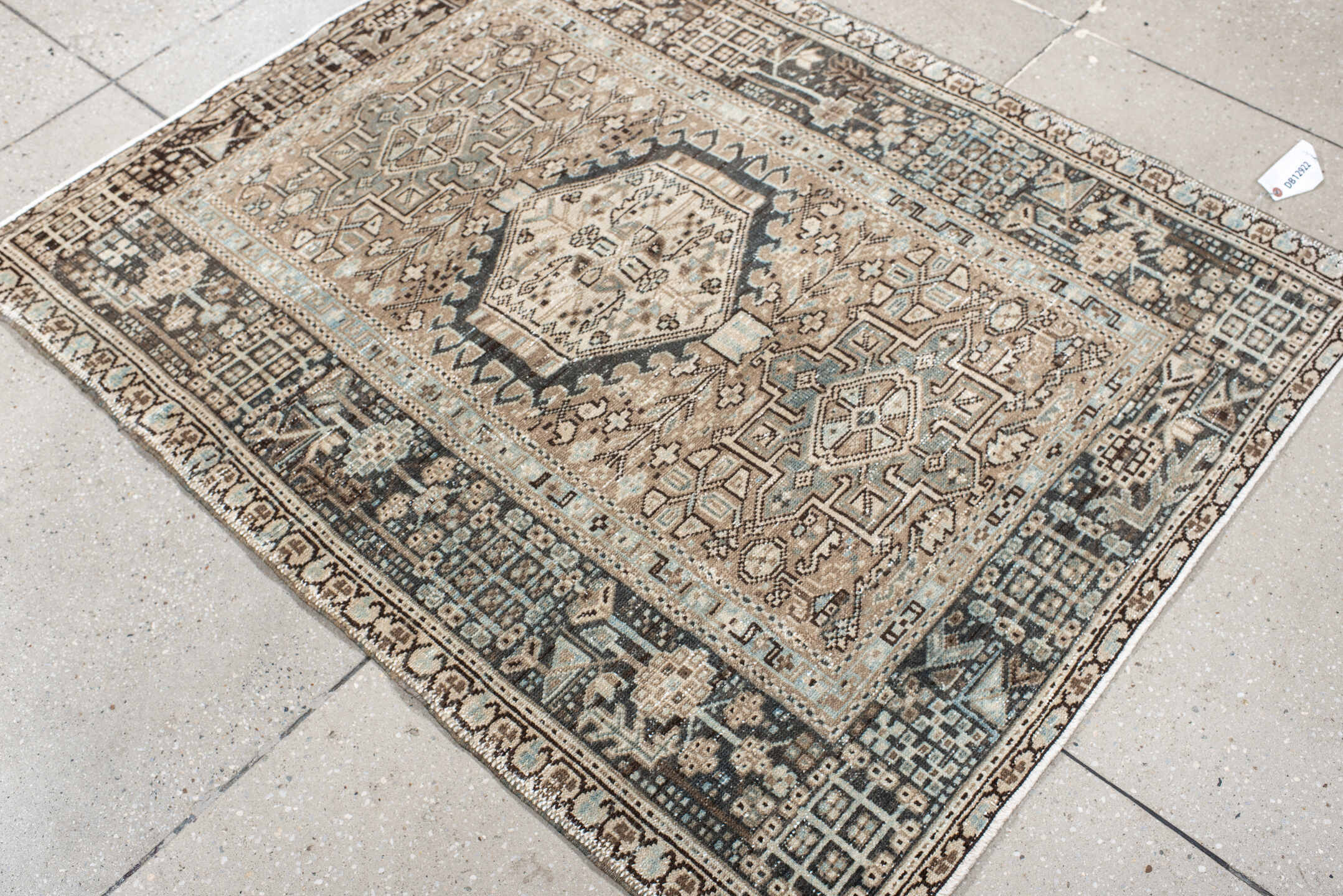 3' x 4' one-of-a-kind handmade vintage Karaje small size rug. Color palette: ivory, brown, charcoal, taupe, slate, camel