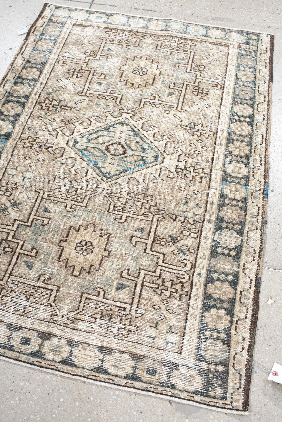 2' x 4' one-of-a-kind handmade vintage Karaje small size rug. Color palette: antiquewhite, black, blue, brown, charcoal