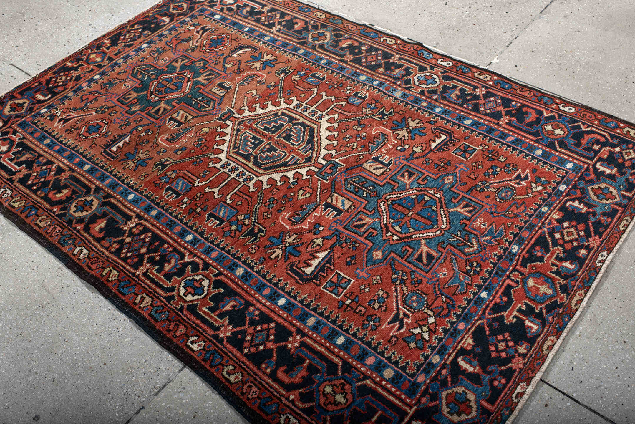 4' x 6' one-of-a-kind handmade antique Karaje small size rug. Color palette: rust, navy, sky_blue, ivory, terracotta