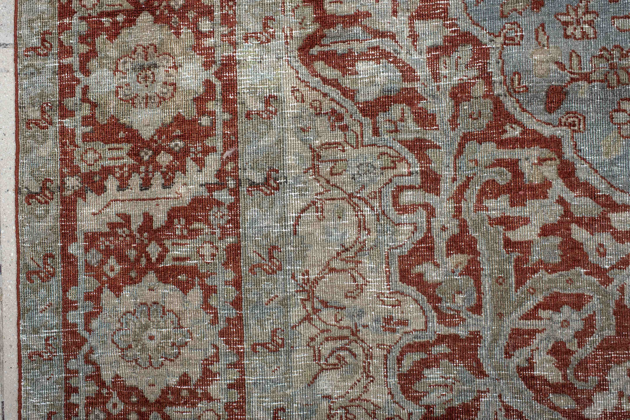 7' x 10' one-of-a-kind handmade antique Heriz large size rug. Color palette: rust, pale blue, ivory, brick, sage, taupe