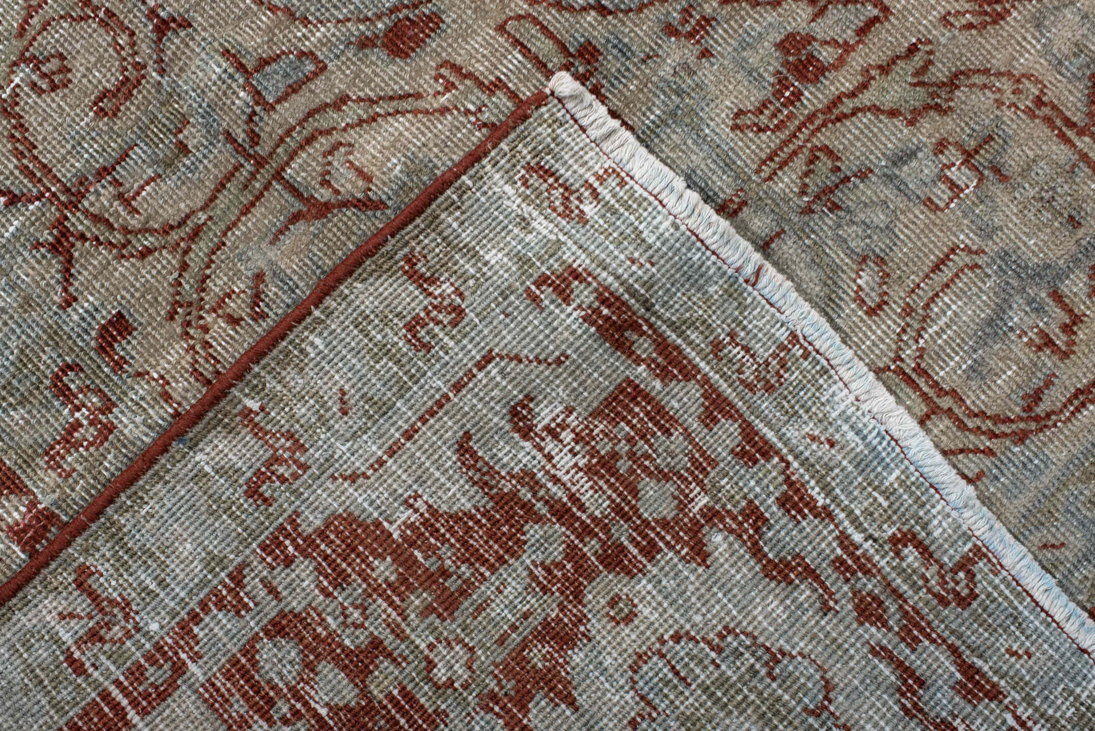 7' x 10' one-of-a-kind handmade antique Heriz large size rug. Color palette: rust, pale blue, ivory, brick, sage, taupe