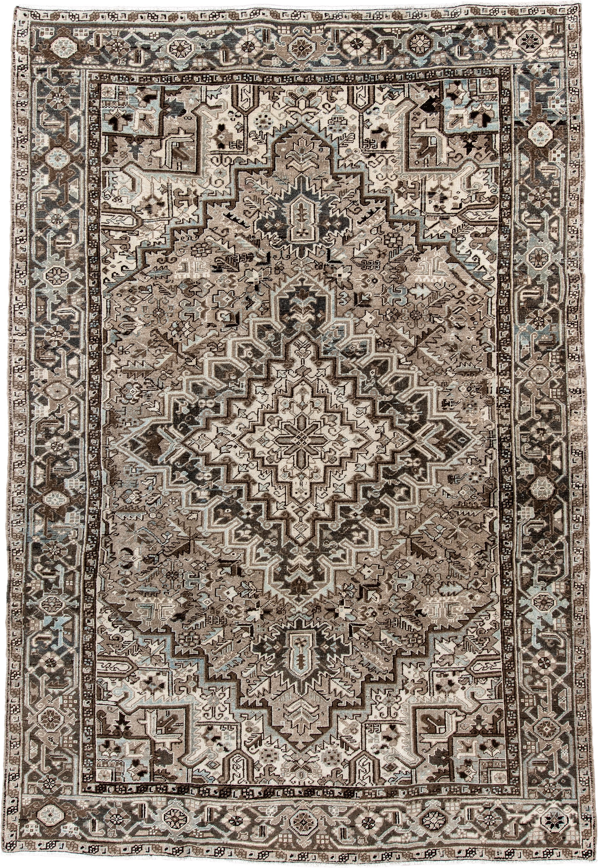 7' x 11' one-of-a-kind handmade antique Heriz large size rug. Color palette: taupe, brown, ivory, charcoal, pale blue, camel