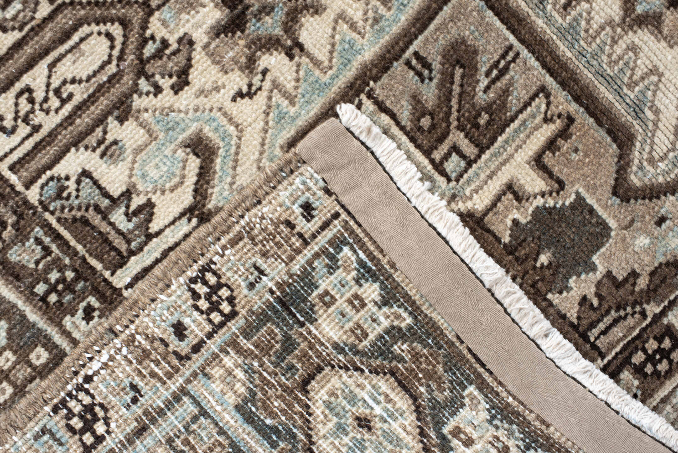 7' x 11' one-of-a-kind handmade antique Heriz large size rug. Color palette: taupe, brown, ivory, charcoal, pale blue, camel