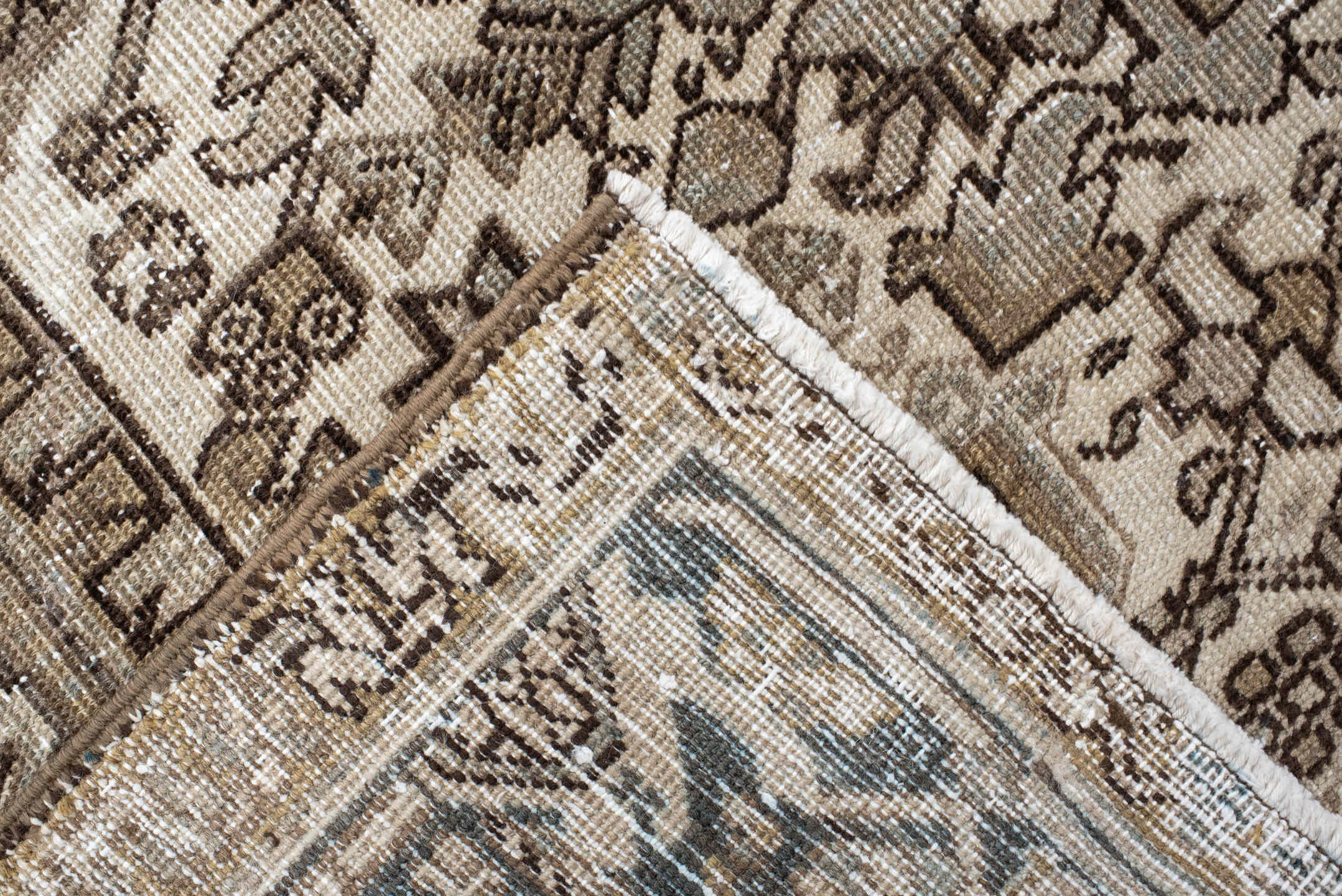 6' x 9' one-of-a-kind handmade antique Heriz rug. Color palette: ivory, taupe, camel, charcoal, brown, sage, beige, gray