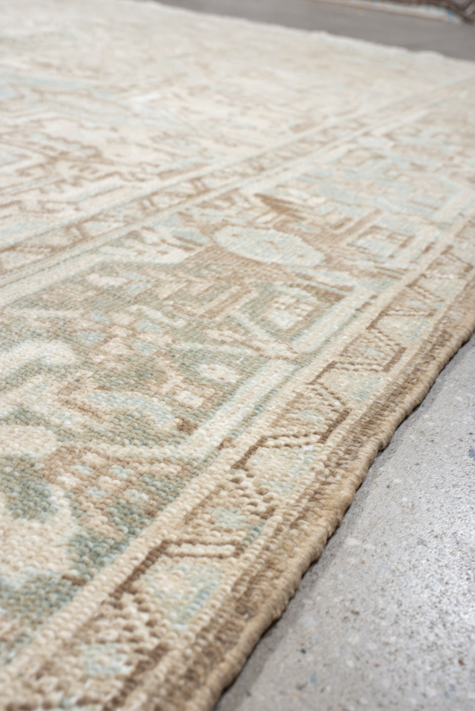 8' x 10' one-of-a-kind handmade antique Heriz large size rug. Color palette: ivory, taupe, pale_blue, sage, beige, camel