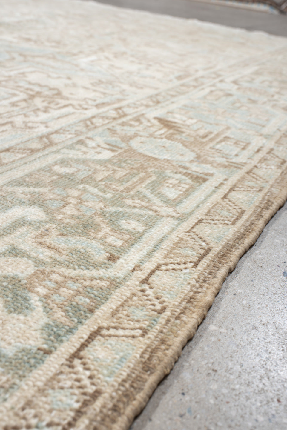 8' x 10' one-of-a-kind handmade antique Heriz large size rug. Color palette: ivory, taupe, pale_blue, sage, beige, camel