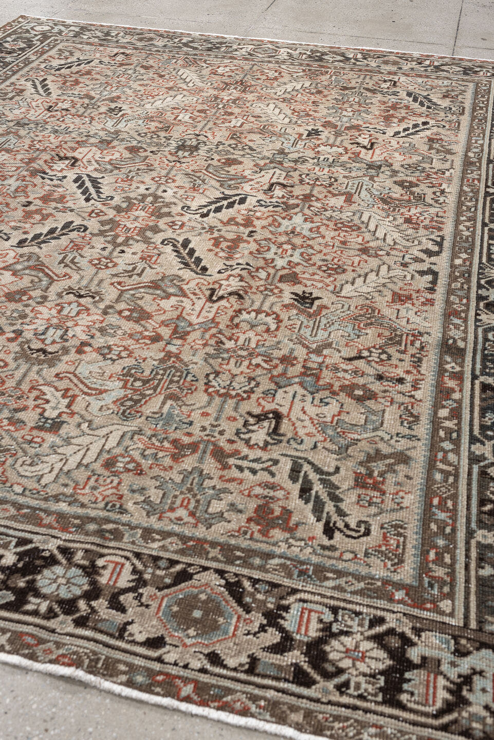 8' x 9' one-of-a-kind handmade vintage rug. Color palette: ivory, charcoal, slate, taupe, terracotta, brown, black, gray