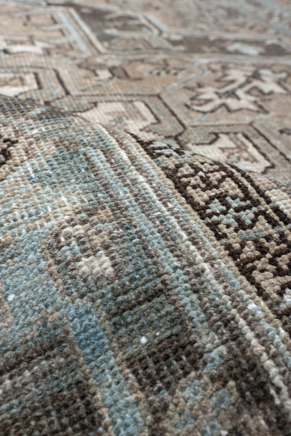 6' x 9' one-of-a-kind handmade antique Heriz medium size rug. Color palette: taupe, sky blue, charcoal, ivory, slate, brown