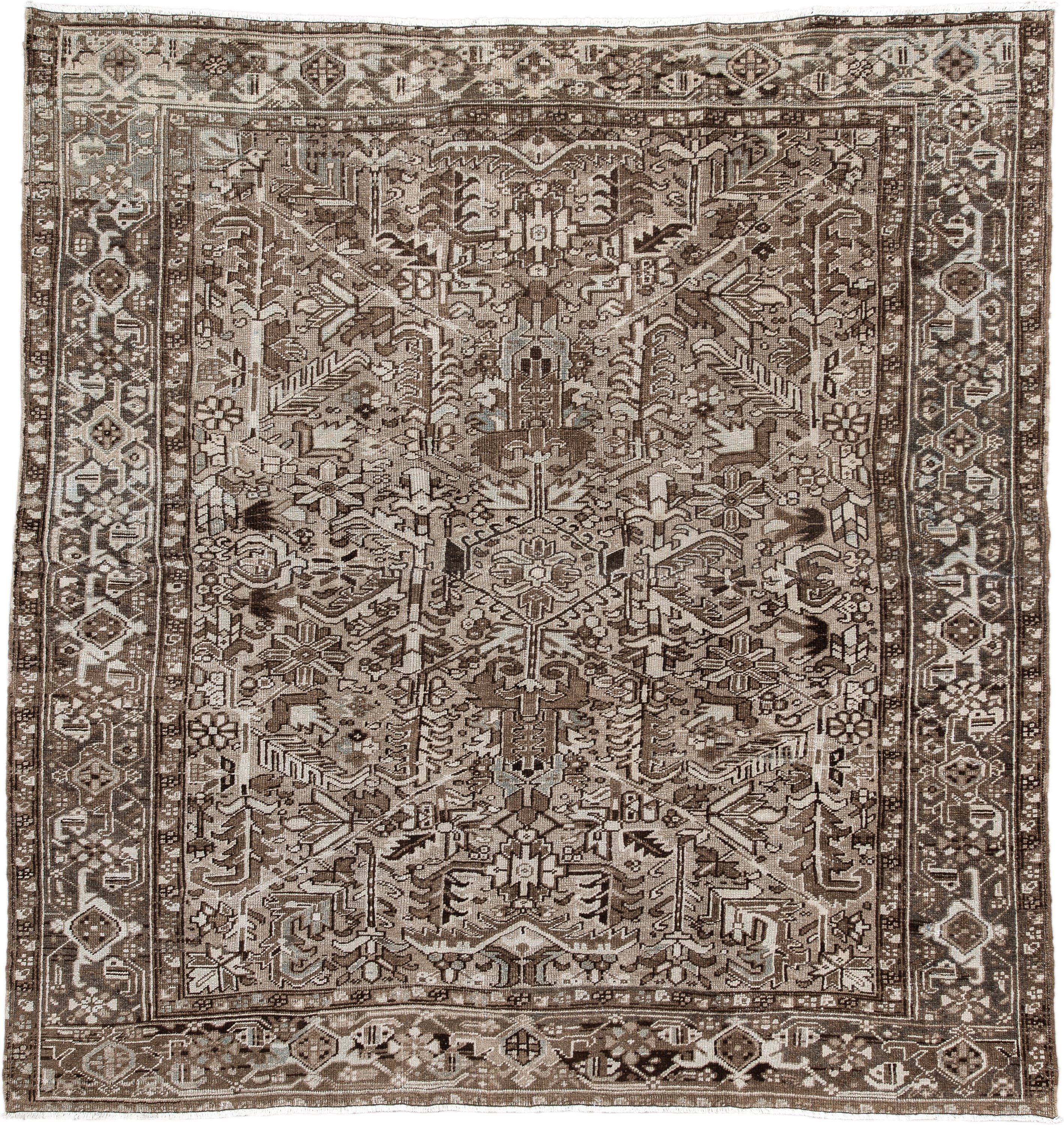 7' x 7' one-of-a-kind handmade antique Heriz rug. Color palette: taupe, brown, ivory, gray, charcoal, beige, black