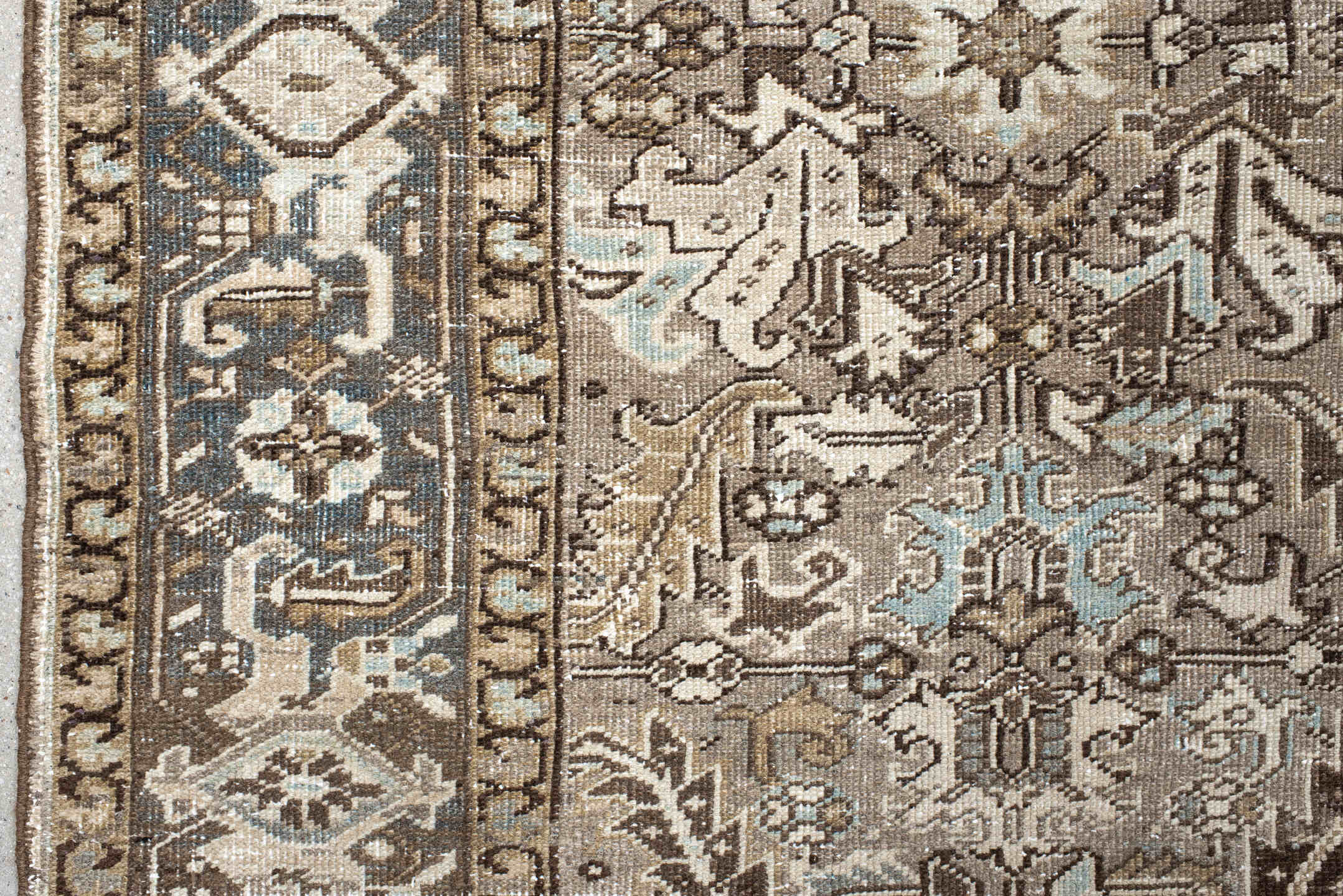 7' x 8' one-of-a-kind handmade antique Heriz rug. Color palette: taupe, brown, ivory, powder_blue, beige, charcoal, gray