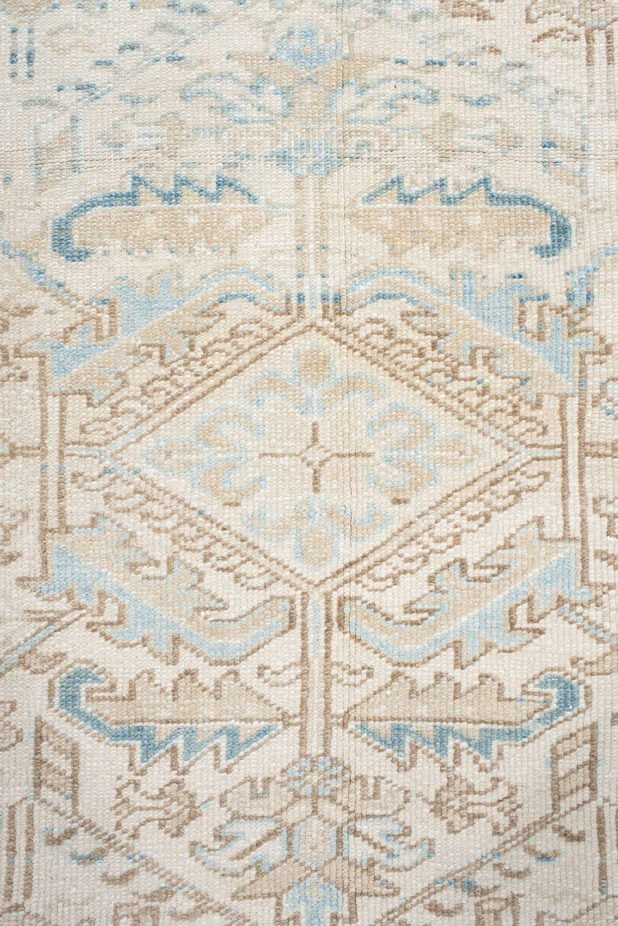 7' x 9' one-of-a-kind handmade antique Heriz large size rug. Color palette: ivory, sky blue, beige, taupe, camel, light blue