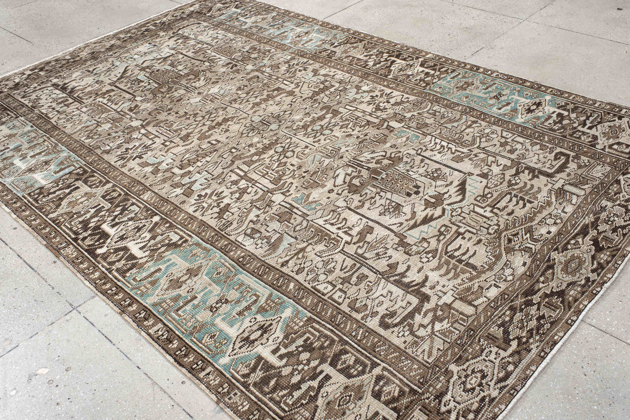 7' x 10' one-of-a-kind handmade antique Heriz large size rug. Color palette: ivory, brown, sky_blue, taupe, charcoal