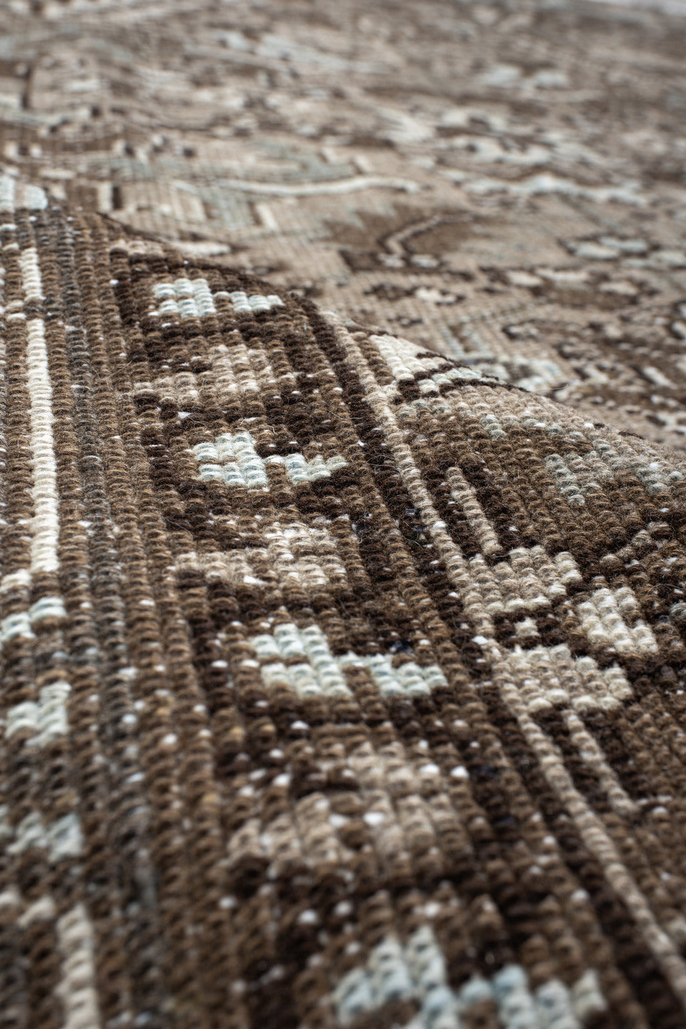 6' x 8' one-of-a-kind handmade vintage Heriz medium size rug. Color palette: black, brown, charcoal, dark gray, floral white