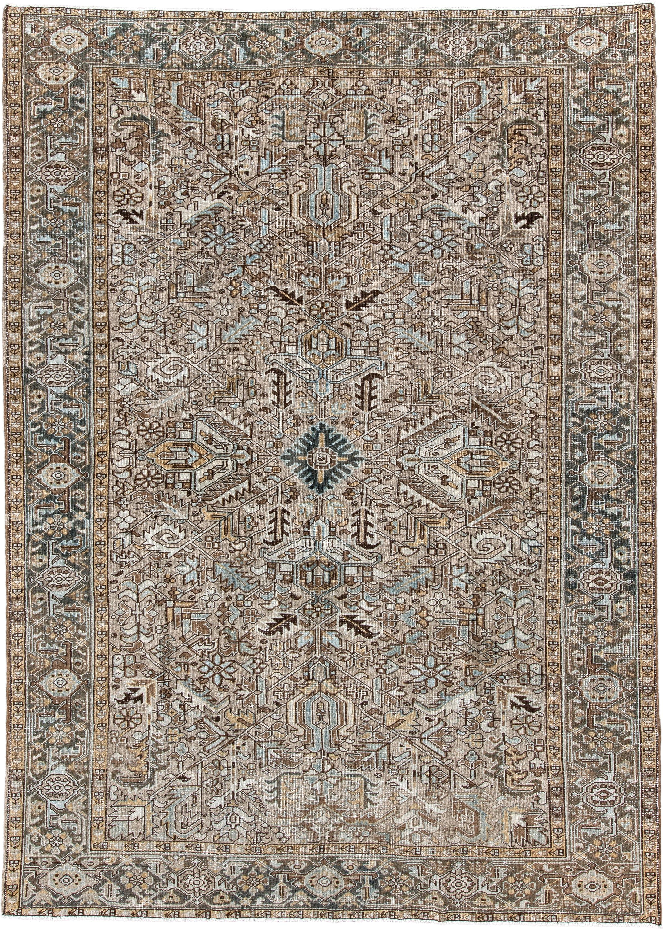 7' x 10' one-of-a-kind handmade antique Heriz large size rug. Color palette: taupe, ivory, slate, camel, brown, pale blue