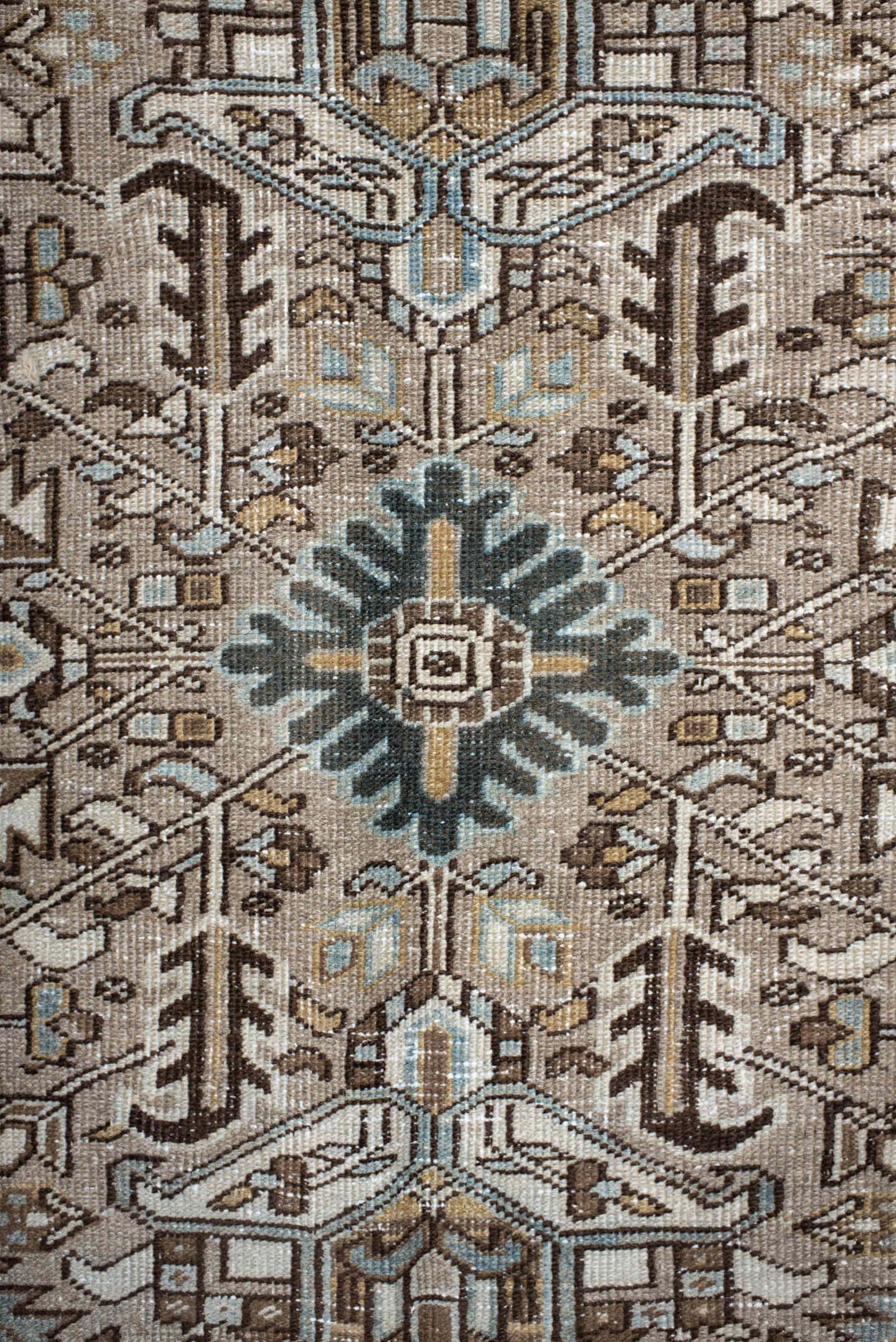 7' x 10' one-of-a-kind handmade antique Heriz large size rug. Color palette: taupe, ivory, slate, camel, brown, pale blue