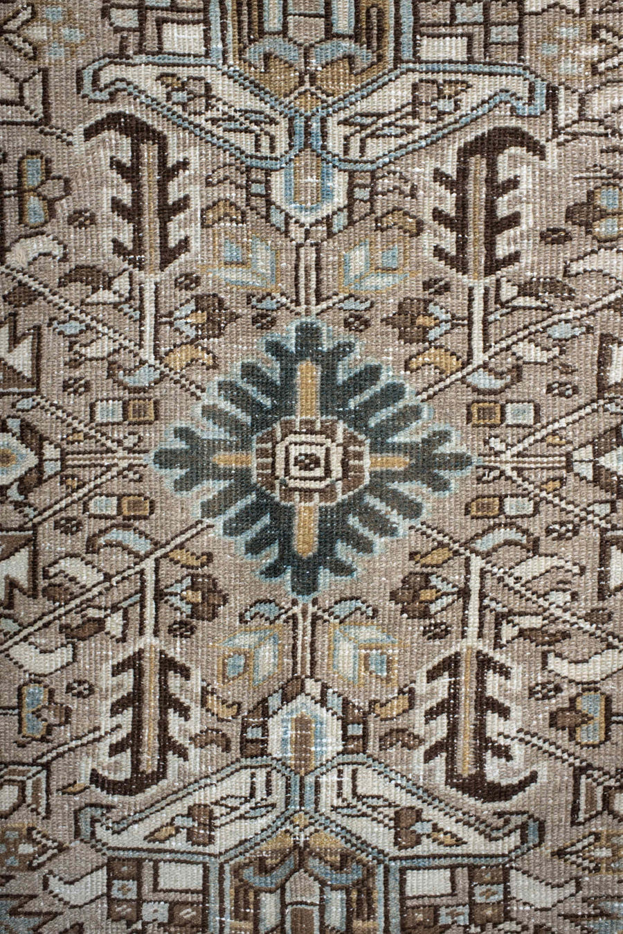 7' x 10' one-of-a-kind handmade antique Heriz large size rug. Color palette: taupe, ivory, slate, camel, brown, pale blue