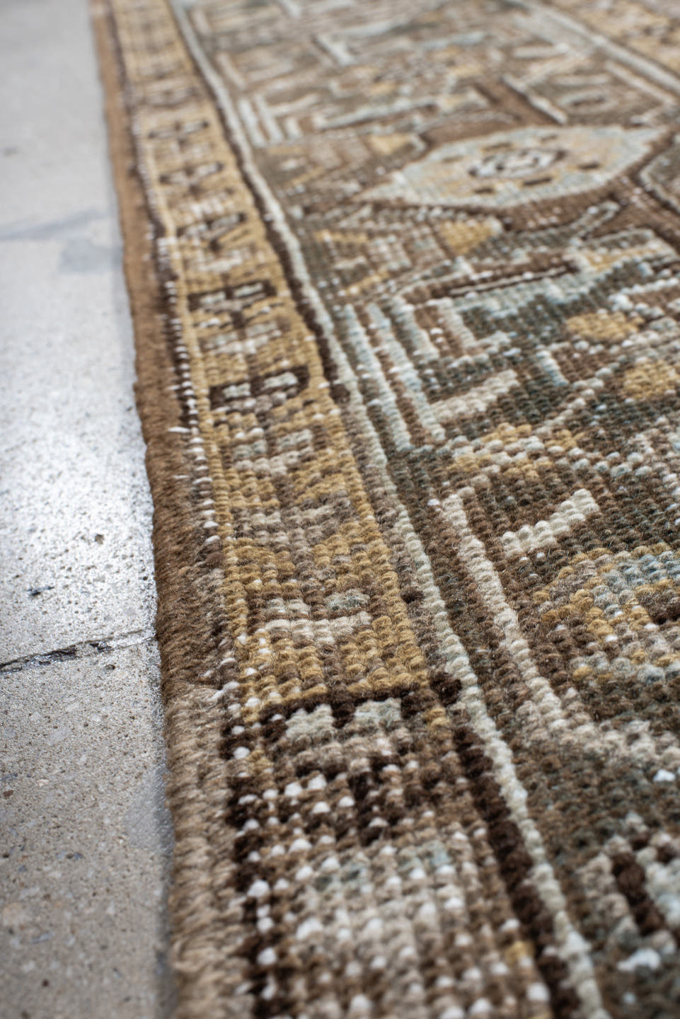 7' x 10' one-of-a-kind handmade antique Heriz large size rug. Color palette: taupe, ivory, slate, camel, brown, pale blue