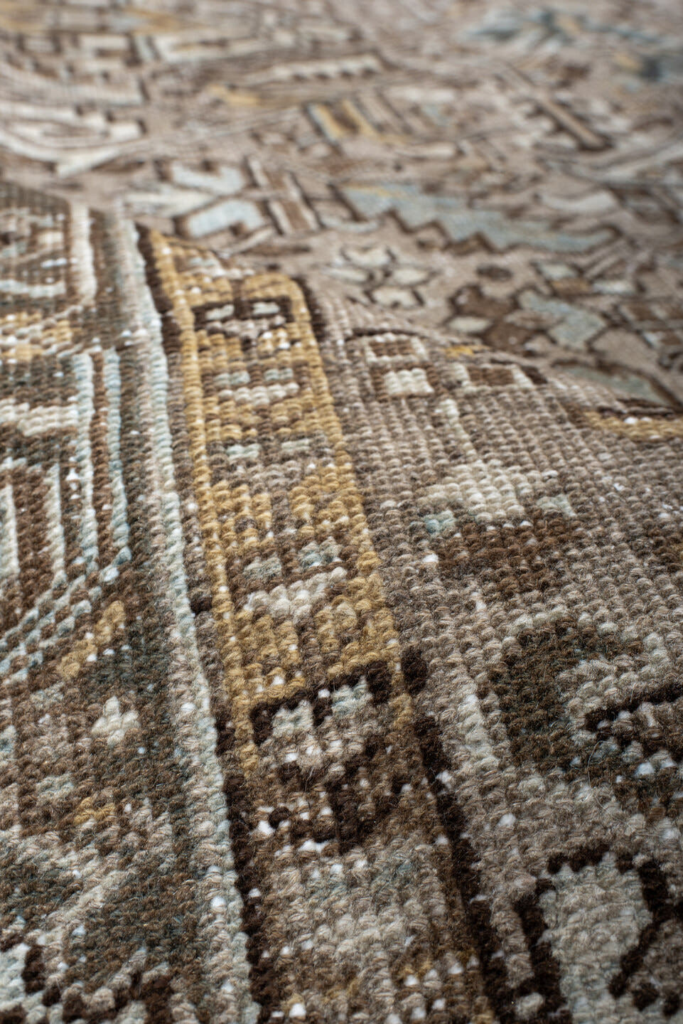 7' x 10' one-of-a-kind handmade antique Heriz large size rug. Color palette: taupe, ivory, slate, camel, brown, pale blue