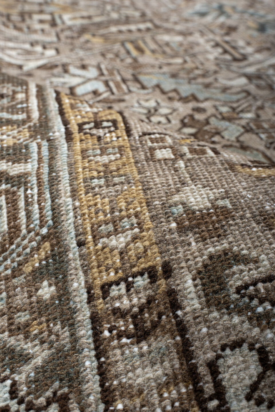 7' x 10' one-of-a-kind handmade antique Heriz large size rug. Color palette: taupe, ivory, slate, camel, brown, pale blue